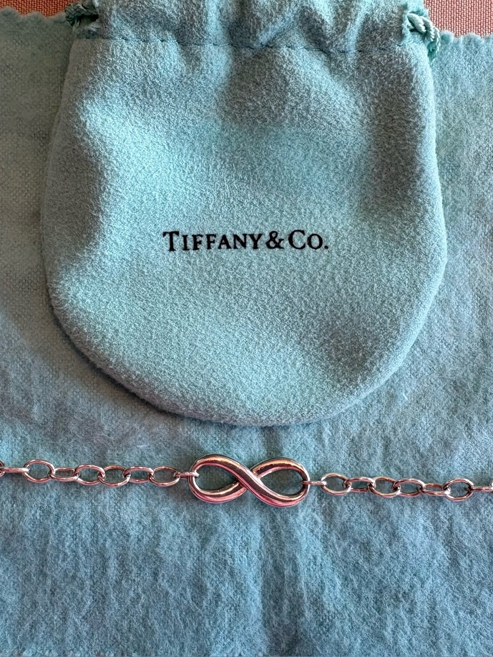 Tiffany & Co. Silver Infinity Link Bracelet with Signature Blue Pouch